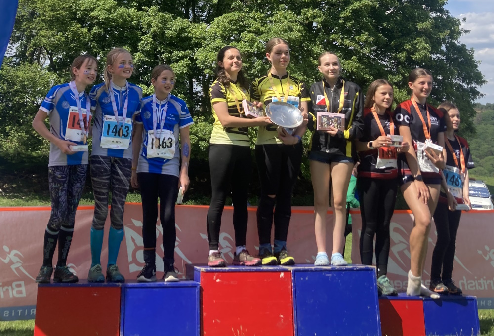 The CLOK W14 relay team on the podium
