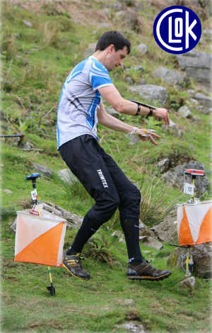 An orienteer 
arriving at a control